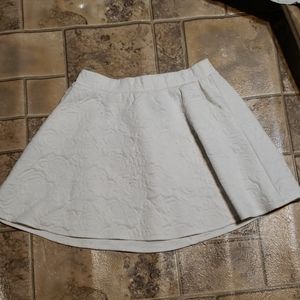 White skirt with floral design
